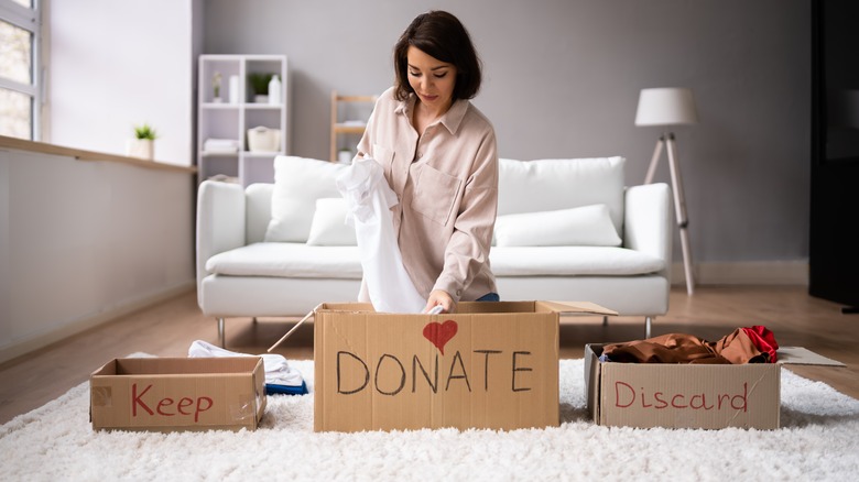 woman decluttering