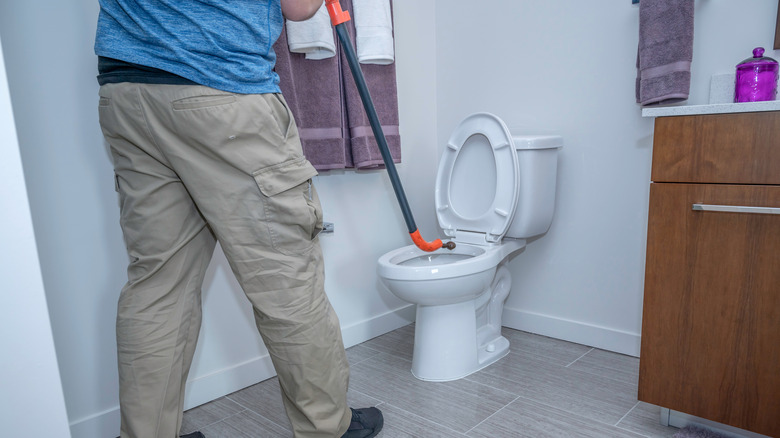 How to Fix a Toilet - Using a Toilet Auger 