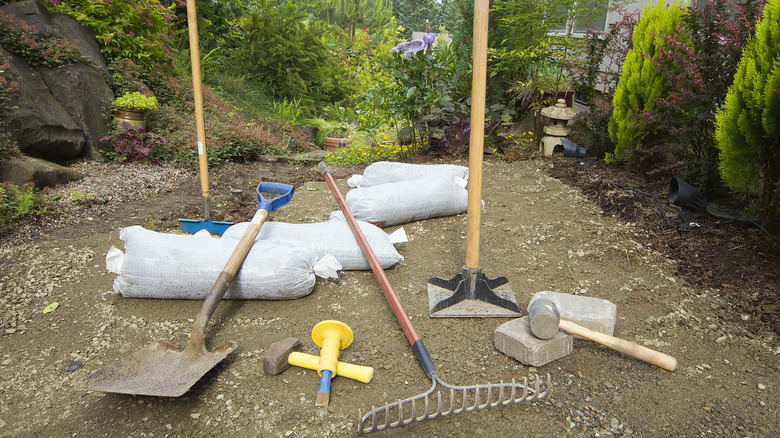 Zen garden tools in dirt