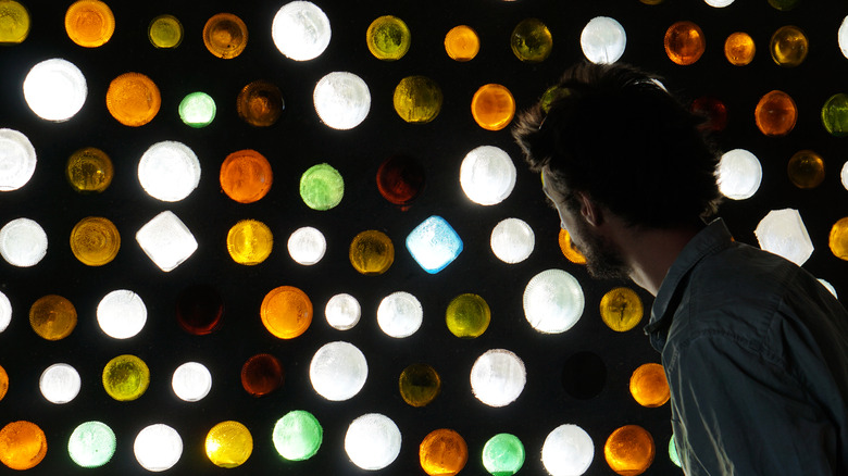 Glass bottle wall in Earthship