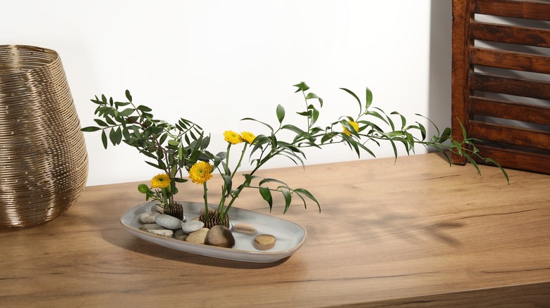 ikebana vase on table