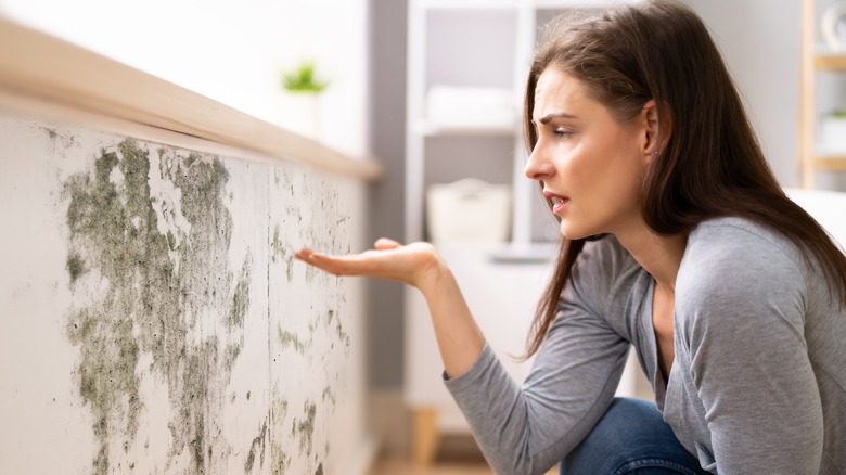 woman discovering mold