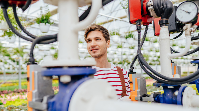 Aquaponic farmer with equipment