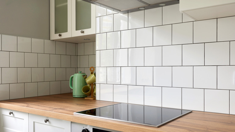 Modern kitchen with white subway tile