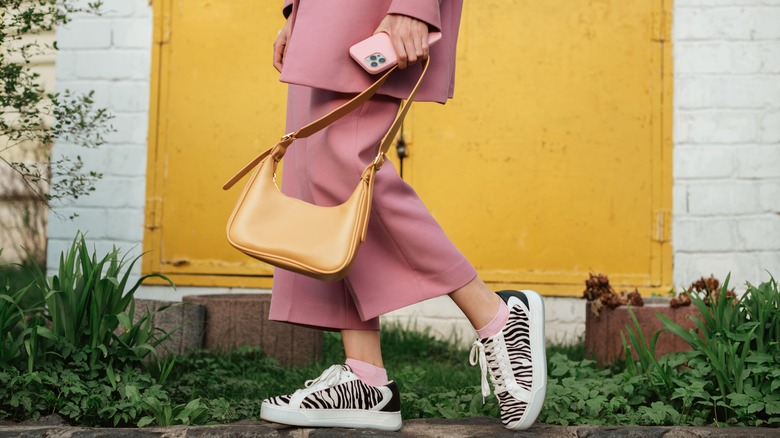 pink outfit with zebra shoes