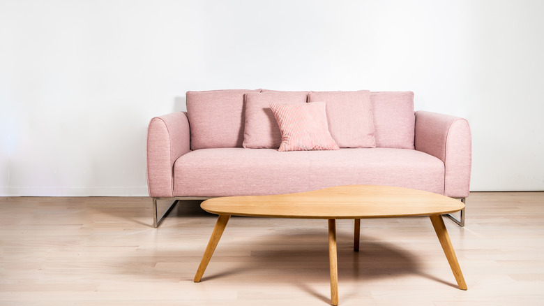 Seventies style furniture in white room