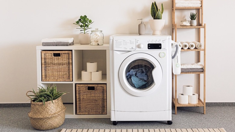 Laundry room with washing machine