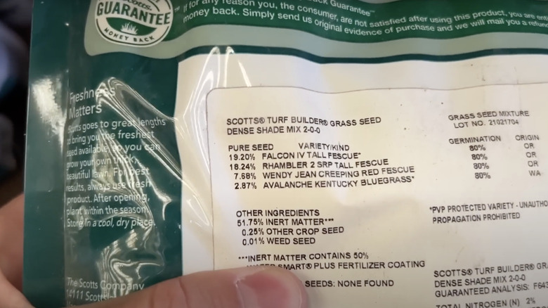 A label on the back of a bag of lawn seed lists the percentages of the different materials the bag contains.