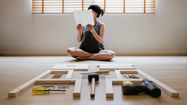 woman and furniture pieces 