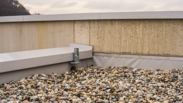 An up close view of gravel on a commercial flat roof