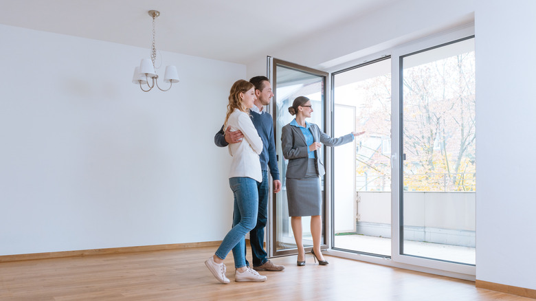 Realtor showing home to couple