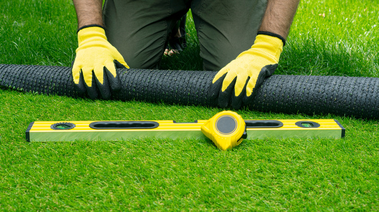 Personal installing artificial turf