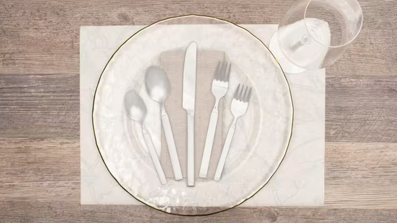 flatware set on clear plate