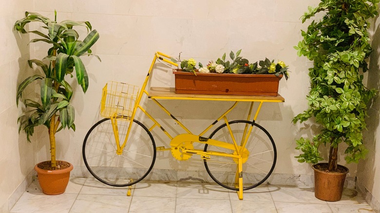 Bicycle repurposed into small table 