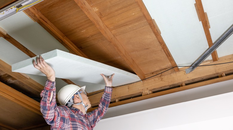 Installing insulation under floor