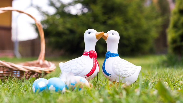 Holiday themed decorative geese in yard