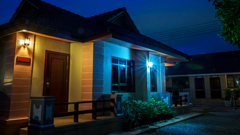 House with differing white lights