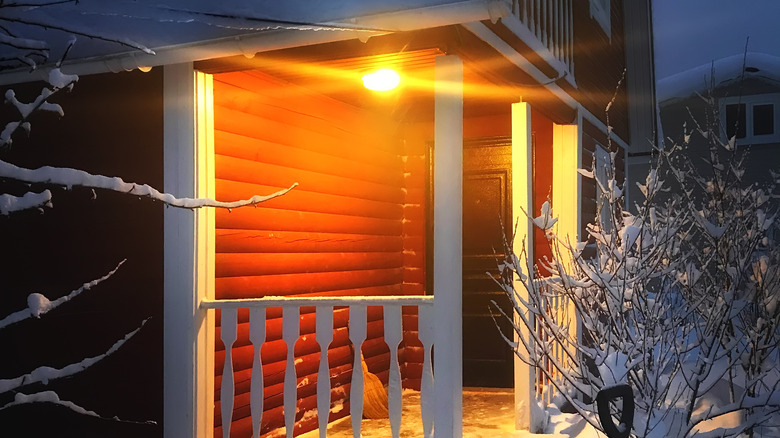 House with orange porch light