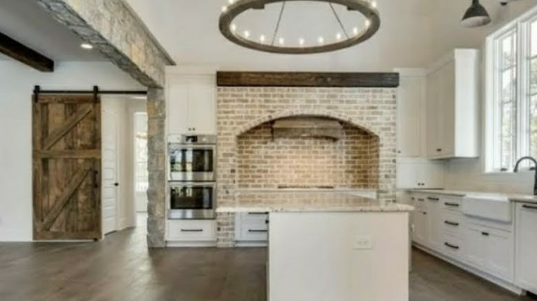 Chandelier over kitchen and dining area 