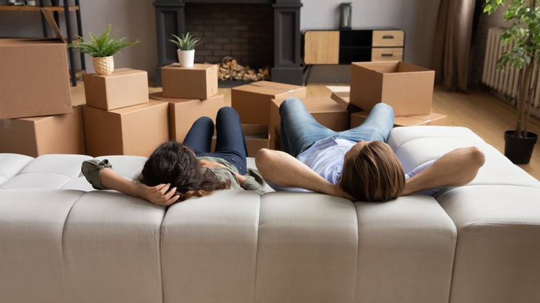 homeowners relaxing on couch