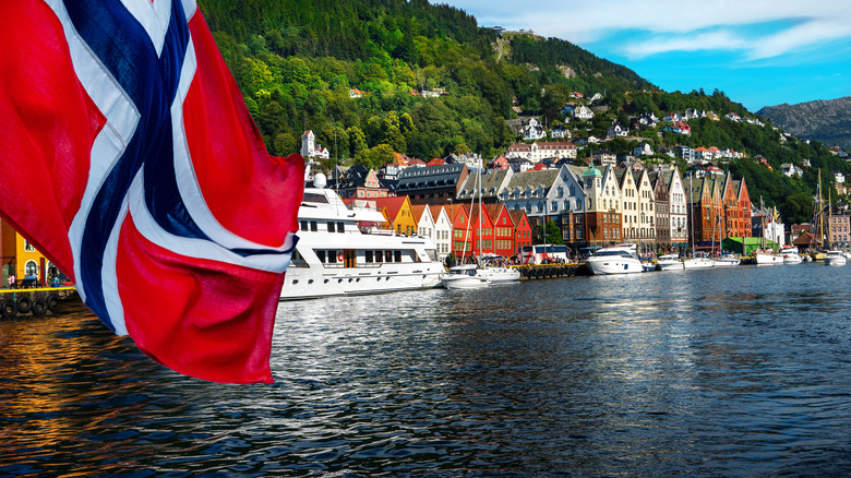 Norwegian harbor with Norwegian flag