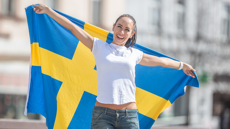 woman with Swedish flag