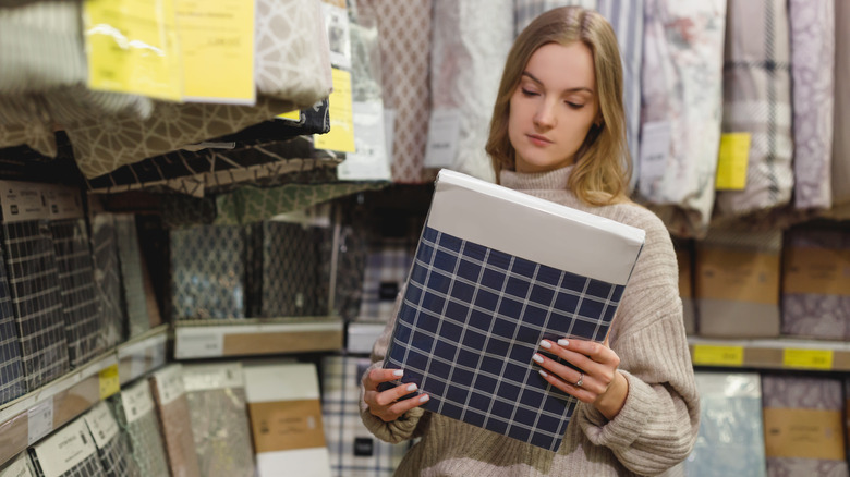 woman looking at sheet set