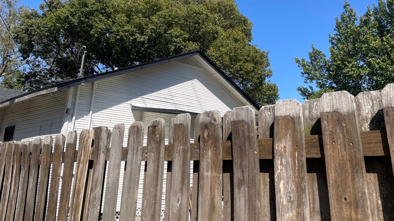 old wornshadow box fence