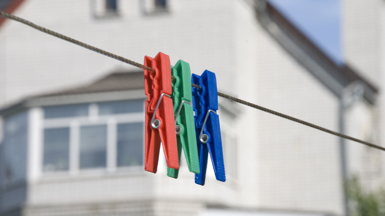 Clothespins on line in neighborhood