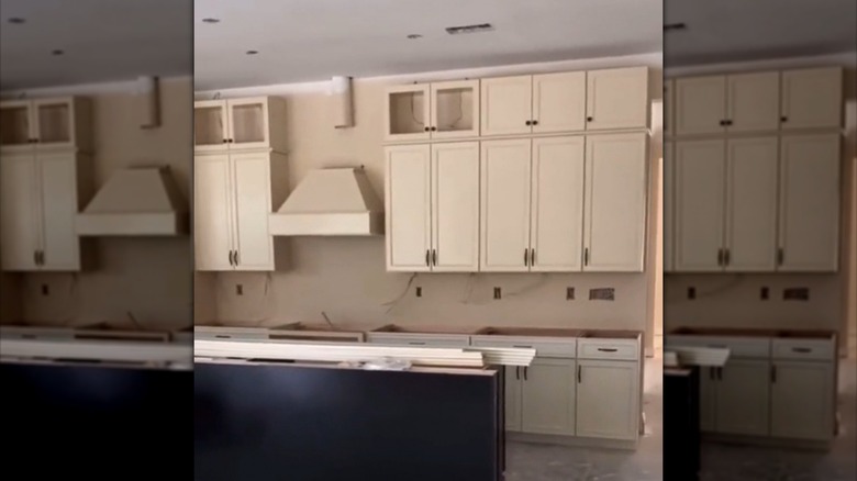 Double-stacked cabinets in kitchen