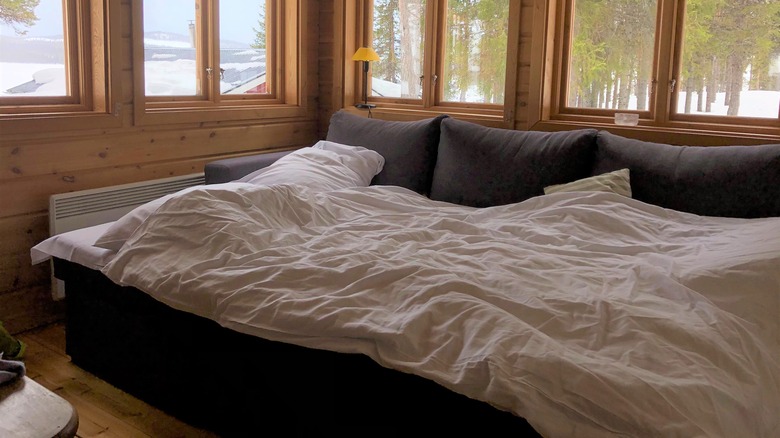 sleeper sofa made into cozy bed