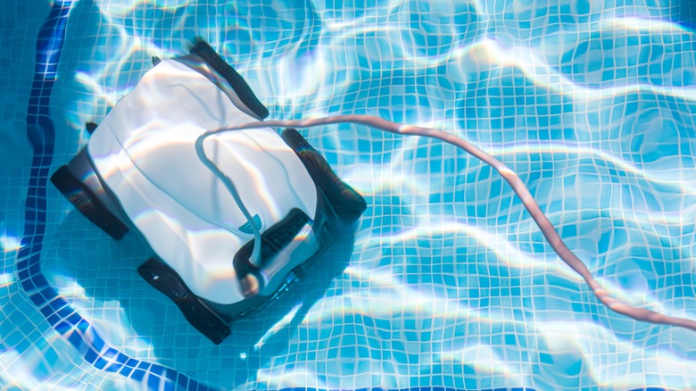 Robot pool cleaner in swimming pool