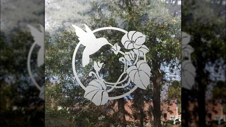 Hummingbird decal on glass