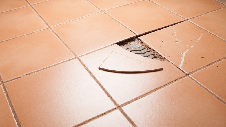 chipped tile on floor