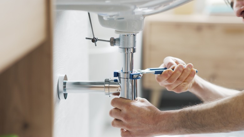 Removing trap from sink drain