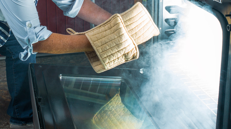 smoke pouring from oven