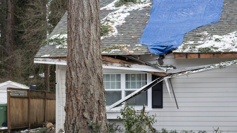 A house is damaged by a severe winter storm