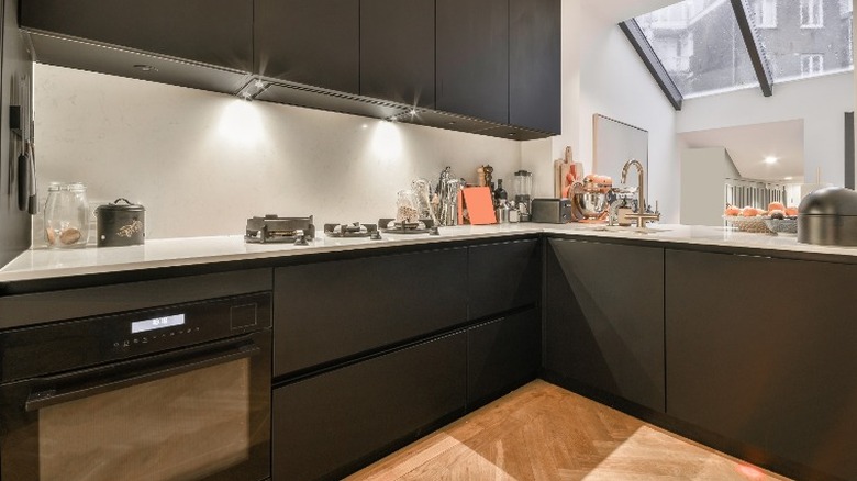 A modern matte black kitchen