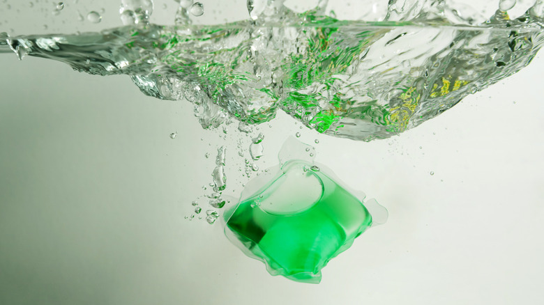 detergent pod splashing into water