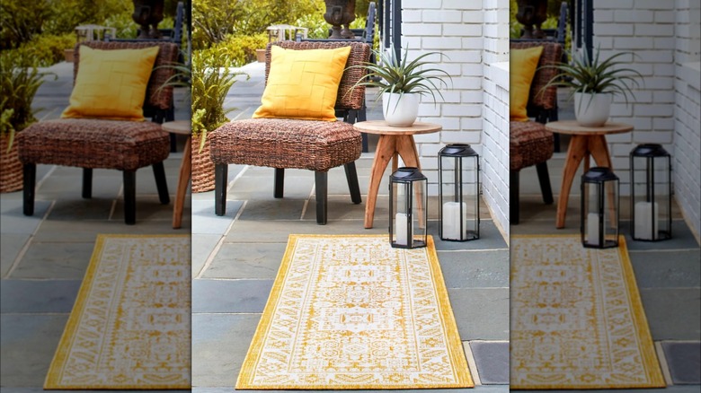 Patio area with yellow rug