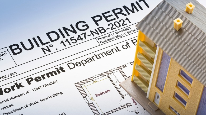 Home miniature on building permit