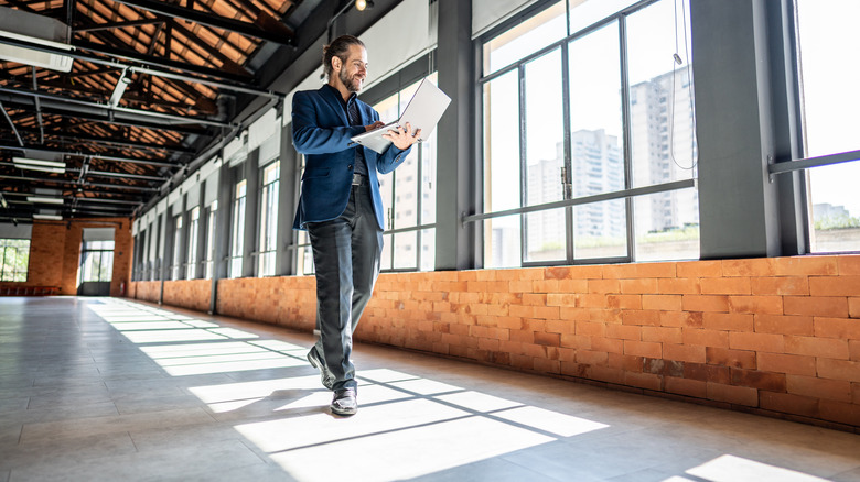 Person walking through empty office