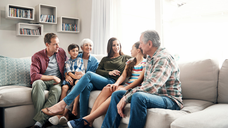 family gathered on couch