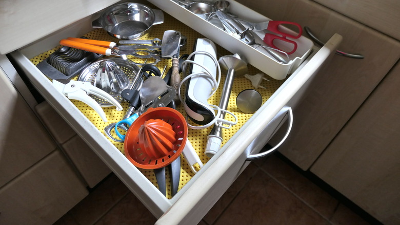 unorganized kitchen drawer