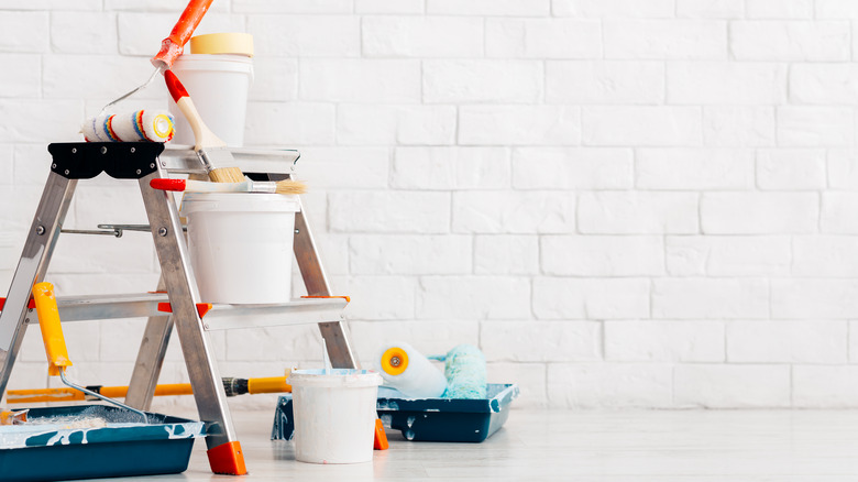 step ladder with painting supplies 