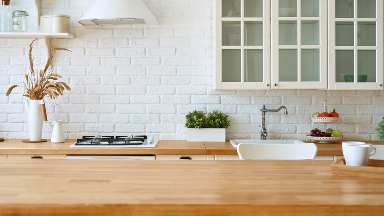 a kitchen with wood counters