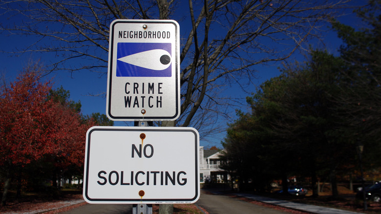 crime watch and no soliciting signs