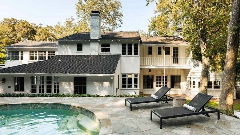 backyard of home with patio and pool