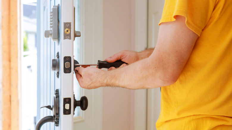 person changing the locks