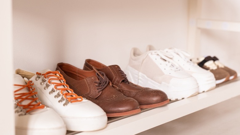 Row of footwear in a closet